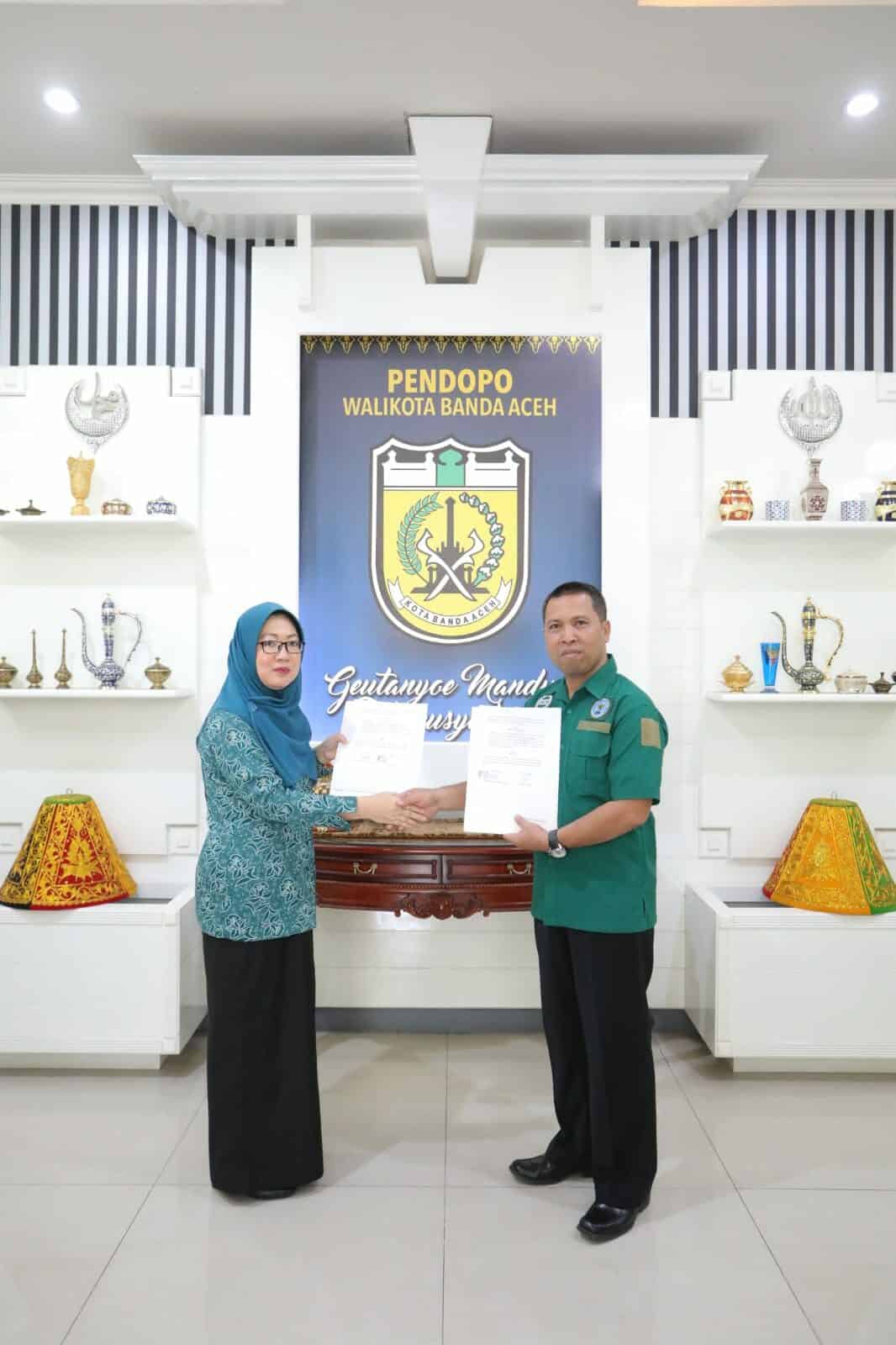 Penandatanganan Perjanjian Kerjasama antara Tim Penggerak PKK Kota Banda Aceh dengan Badan Narkotika Nasional Kota Banda Aceh Penandatanganan Perjanjian Kerjasama antara Tim Penggerak PKK Kota Banda Aceh dengan Badan Narkotika Nasional Kota Banda Aceh